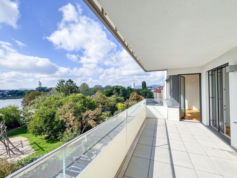 Wohnung - 1210, Wien - 3-Zimmer-Wohnung mit Balkon & Blick auf die Alte Donau – Top-Zustand, klimatisiert, zentral begehbar!