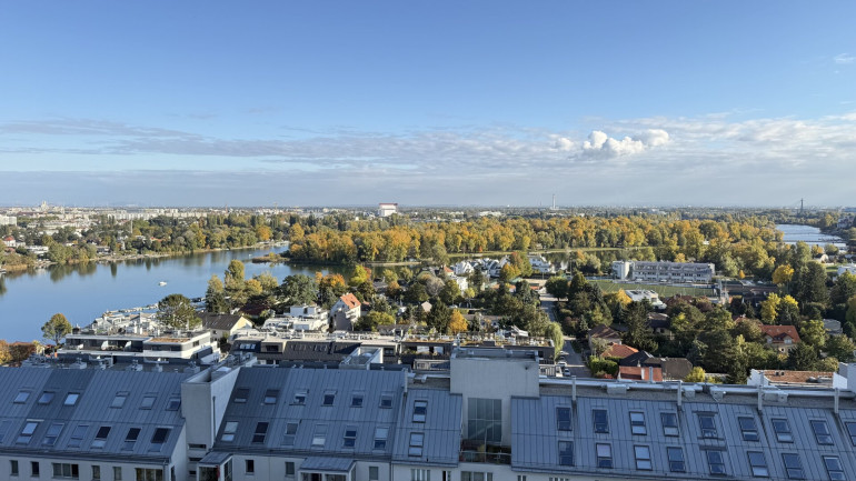 Wohnung - 1220, Wien - Teilmöblierte 3 Zimmer mit Klima und verglaster Loggia mit spektakulärem Weitblick & optionalem Garagenstellplatz