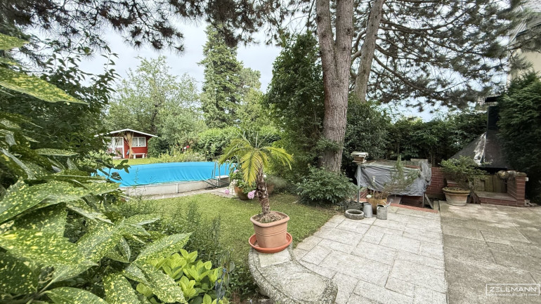 Haus - 1230, Wien - Charmantes Einfamilienhaus mit Pool, Gartenidylle und Entwicklungspotenzial in Bestlage von Wien-Mauer | ZELLMANN IMMOBILIEN
