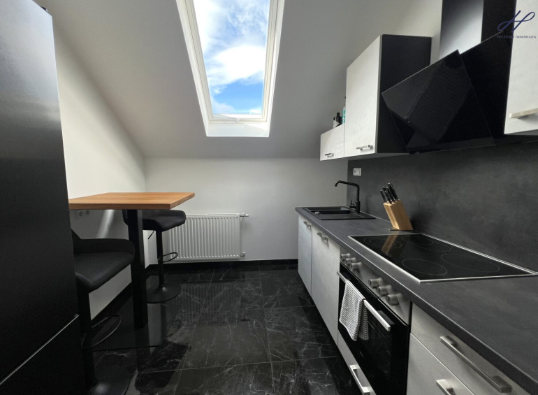 Wohnung - 2860, Kirchschlag in der Buckligen Welt - Modernisierte Dachgeschosswohnung mit Balkon & Blick auf die Burgruine Kirchschlag