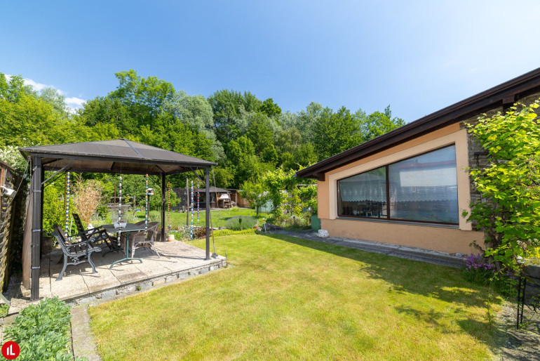 Haus - 2440, Gramatneusiedl - Bungalow mit traumhafter Grünoase, | 1043m² Grundstück | Werkstatt | Wellnessbereich | Wohnen, Entspannen und Genießen in bester Grünruhelage!