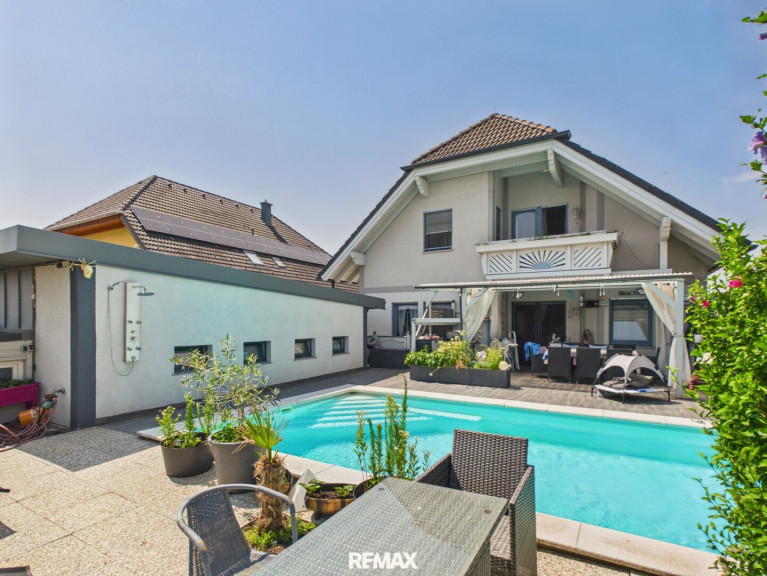 Haus - 2486, Pottendorf - Familienidylle mit moderner Energietechnik, Pool und traumhaftem Garten in Pottendorf