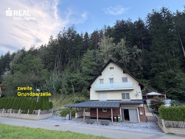 Haus - 8770, Sankt Michael in Obersteiermark - Einfamilienhaus mit Terrassenzubau, Flugdach und Carport in ruhiger Randlage von St. Michael in Obersteiermark
