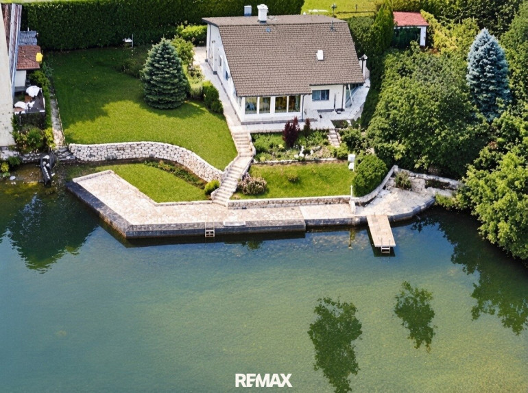 Haus - 2491, Steinbrunn - Uferparzelle am Privatsee mit 165 m² Einfamilienhaus in absoluter Ruhelage